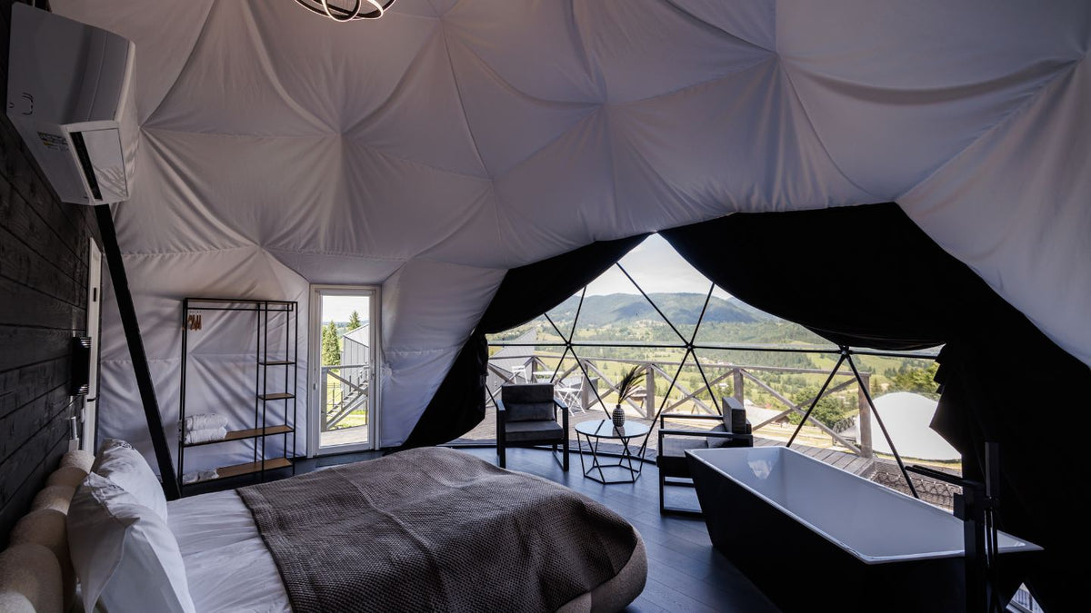 Warm geodesic dome interior kept comfortable year round by insulation and a single HVAC unit