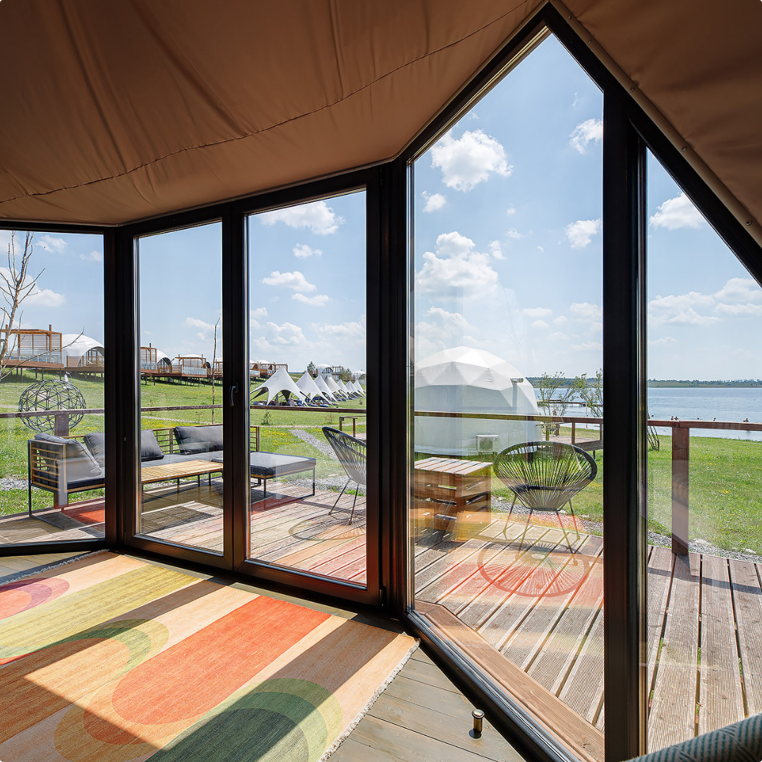 Geodesic dome interior with the Signature glass door and double-pane glass windows